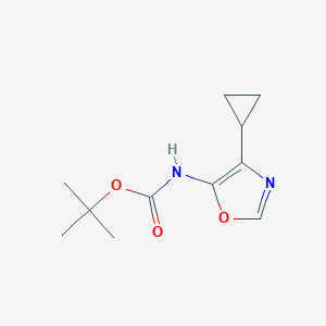 molecular formula C11H16N2O3 B1381370 tert-butyl N-(4-cyclopropyl-1,3-oxazol-5-yl)carbamate CAS No. 1803608-46-9