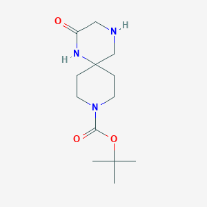 molecular formula C13H23N3O3 B1381713 tert-Butyl 2-oxo-1,4,9-triazaspiro[5.5]undecane-9-carboxylate CAS No. 1445951-40-5