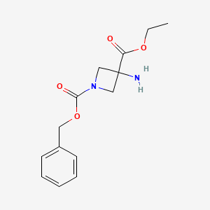 molecular formula C14H18N2O4 B1382253 1-Benzyl 3-ethyl 3-aminoazetidine-1,3-dicarboxylate CAS No. 1434142-16-1