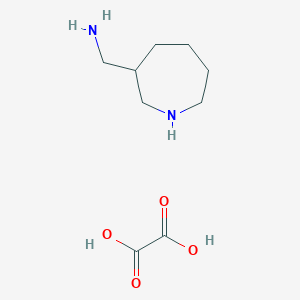 molecular formula C9H18N2O4 B1382380 1-(Azepan-3-yl)methanamine; oxalic acid CAS No. 1803594-24-2