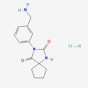 molecular formula C14H18ClN3O2 B1382477 3-[3-(Aminomethyl)phenyl]-1,3-diazaspiro[4.4]nonane-2,4-dione hydrochloride CAS No. 1803588-89-7