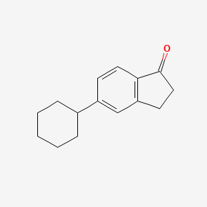 molecular formula C15H18O B13824784 5-Cyclohexyl-2,3-dihydro-1H-inden-1-one CAS No. 38240-91-4