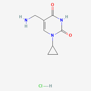 molecular formula C8H12ClN3O2 B1382586 5-(aminomethyl)-1-cyclopropylpyrimidine-2,4(1H,3H)-dione hydrochloride CAS No. 2034154-05-5