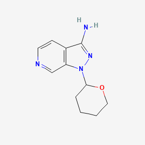 molecular formula C11H14N4O B1382791 1-(Tetrahydro-2H-pyran-2-yl)-1H-pyrazolo[3,4-c]pyridin-3-amine CAS No. 1416712-70-3
