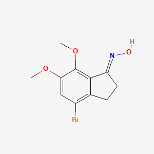 molecular formula C11H12BrNO3 B1382909 (E)-4-Bromo-6,7-dimethoxy-2,3-dihydroinden-1-one oxime CAS No. 18028-30-3