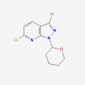 molecular formula C11H11BrClN3O B1383076 3-Bromo-6-chloro-1-(tetrahydro-2H-pyran-2-yl)-1H-pyrazolo[3,4-b]pyridine CAS No. 1416713-12-6