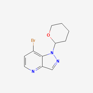 molecular formula C11H12BrN3O B1383080 7-Bromo-1-(tetrahydro-2H-pyran-2-yl)-1H-pyrazolo[4,3-b]pyridine CAS No. 1416712-79-2