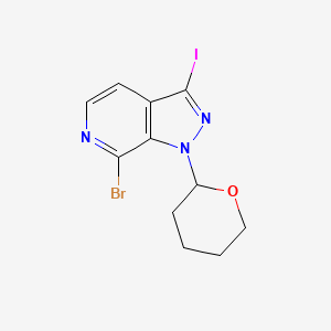 molecular formula C11H11BrIN3O B1383125 7-Bromo-3-iodo-1-(tetrahydro-2H-pyran-2-yl)-1H-pyrazolo[3,4-c]pyridine CAS No. 1416712-91-8