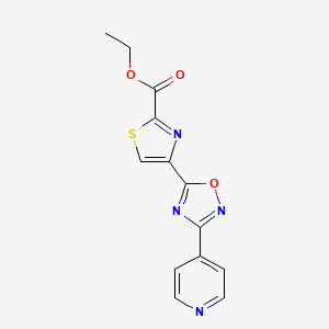 molecular formula C13H10N4O3S B1383357 Ethyl 4-[3-(pyridin-4-yl)-1,2,4-oxadiazol-5-yl]-1,3-thiazole-2-carboxylate CAS No. 1803589-99-2