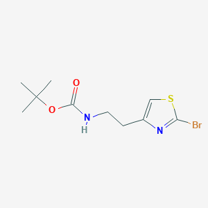 molecular formula C10H15BrN2O2S B1383421 tert-butyl N-[2-(2-bromo-1,3-thiazol-4-yl)ethyl]carbamate CAS No. 1803566-31-5