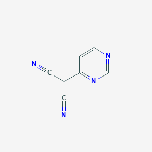 B1383464 2-(Pyrimidin-4-yl)propanedinitrile CAS No. 1803582-85-5