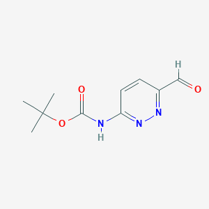 molecular formula C10H13N3O3 B1383559 tert-butyl N-(6-formylpyridazin-3-yl)carbamate CAS No. 1823265-06-0
