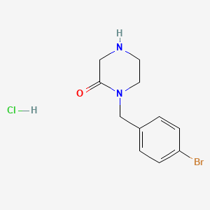 1-[(4-Bromophenyl)methyl]piperazin-2-one hydrochloride