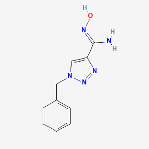 molecular formula C10H11N5O B1384320 1-benzyl-N'-hydroxy-1H-1,2,3-triazole-4-carboximidamide CAS No. 1255791-11-7