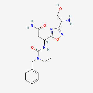 molecular formula C17H24N6O4 B1384713 1,2,4-Oxadiazole-5-propanamide, 3-[(1S)-1-amino-2-hydroxyethyl]-beta-[[[ethyl(phenylmethyl)amino]carbonyl]amino]-, (betaS)- CAS No. 2007110-48-5