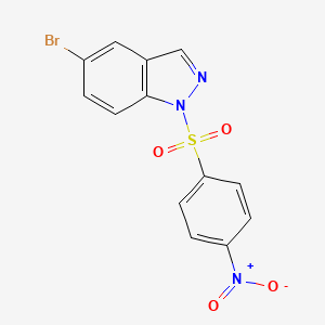 molecular formula C13H8BrN3O4S B13853784 5-Bromo-1-(4-nitrophenyl)sulfonylindazole 