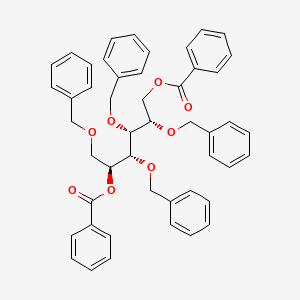 molecular formula C48H46O8 B13856628 [(2S,3R,4R,5S)-5-benzoyloxy-2,3,4,6-tetrakis(phenylmethoxy)hexyl] benzoate 