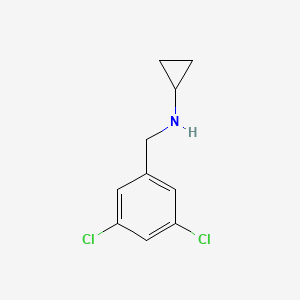 molecular formula C10H11Cl2N B1386058 N-[(3,5-dichlorophenyl)methyl]cyclopropanamine CAS No. 1094641-89-0
