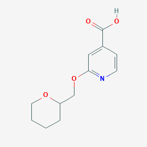 molecular formula C12H15NO4 B1386063 2-((Tetrahydro-2H-pyran-2-yl)methoxy)isonicotinic acid CAS No. 1019353-77-5