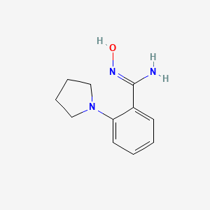 molecular formula C11H15N3O B1386121 N-Hydroxy-2-(pyrrolidin-1-yl)benzimidamide CAS No. 1021243-91-3