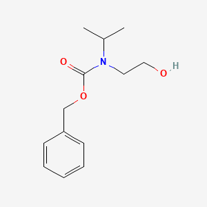 molecular formula C13H19NO3 B1386373 Benzyl N-(2-hydroxyethyl)-N-(propan-2-yl)carbamate CAS No. 1156363-32-4
