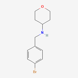 molecular formula C12H16BrNO B1386379 N-[(4-bromophenyl)methyl]oxan-4-amine CAS No. 1157010-00-8