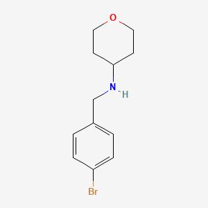 N-[(4-bromophenyl)methyl]oxan-4-amine