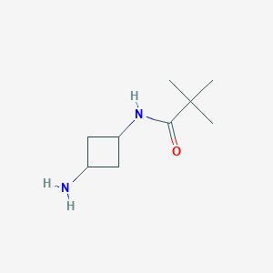 molecular formula C9H18N2O B1386395 N-(3-Aminocyclobutyl)-2,2-dimethylpropanamide CAS No. 1156752-37-2