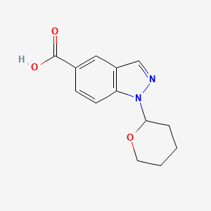 molecular formula C13H14N2O3 B1386664 1-(Tetrahydro-2H-pyran-2-yl)-1H-indazole-5-carboxylic acid CAS No. 1000576-28-2