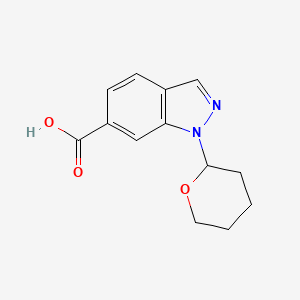 molecular formula C13H14N2O3 B1386725 1-(Tetrahydro-2H-pyran-2-yl)-1H-indazole-6-carboxylic acid CAS No. 1017792-97-0