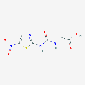 molecular formula C6H6N4O5S B138753 N-(5-Nitro-2-thiazolyl)-N'-carboxymethylurea CAS No. 134335-40-3