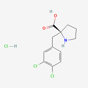 molecular formula C12H14Cl3NO2 B1387984 (S)-2-(3,4-Dichlorobenzyl)pyrrolidine-2-carboxylic acid hydrochloride CAS No. 1217712-28-1