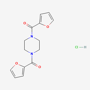 molecular formula C14H15ClN2O4 B1388334 [4-(Furan-2-carbonyl)-piperazin-1-yl]-furan-2-yl-methanone hydrochloride CAS No. 1185293-86-0