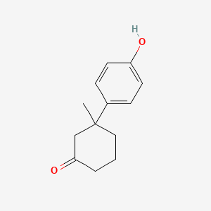molecular formula C13H16O2 B13883936 3-(4-Hydroxyphenyl)-3-methylcyclohexan-1-one 