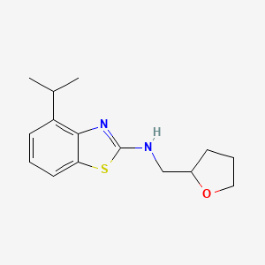 4-isopropyl-N-(tetrahydrofuran-2-ylmethyl)-1,3-benzothiazol-2-amine