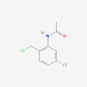 molecular formula C9H9Cl2NO B13884966 N-[5-chloro-2-(chloromethyl)phenyl]acetamide 