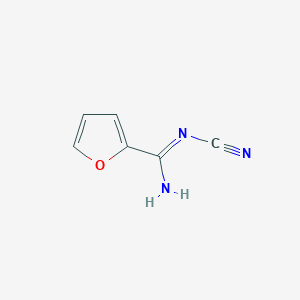 molecular formula C6H5N3O B1388670 N'-cyanofuran-2-carboximidamide CAS No. 1211577-48-8