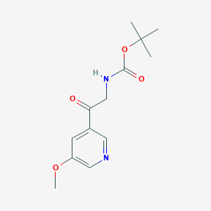 molecular formula C13H18N2O4 B13886815 3-Methoxy-5-(t-butyloxycarbonylaminomethylcarbonyl)-pyridine 