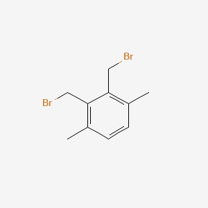 molecular formula C10H12Br2 B13887982 Benzene, 2,3-bis(bromomethyl)-1,4-dimethyl- CAS No. 38108-82-6