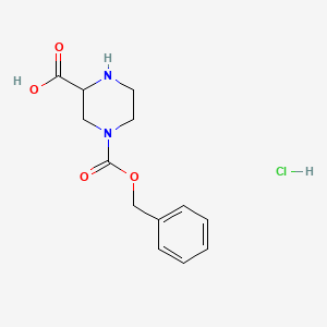 B1388894 4-((Benzyloxy)carbonyl)piperazine-2-carboxylic acid hydrochloride CAS No. 64172-99-2