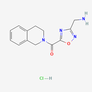 molecular formula C13H15ClN4O2 B1390107 [5-(3,4-dihydroisoquinolin-2(1H)-ylcarbonyl)-1,2,4-oxadiazol-3-yl]methylamine hydrochloride CAS No. 1185302-44-6