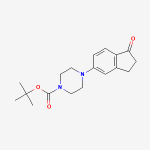 1-Boc-4-(1-oxo-indan-5-YL)-piperazine