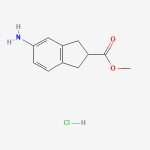 molecular formula C11H14ClNO2 B13910850 Methyl 5-aminoindane-2-carboxylate;hydrochloride 