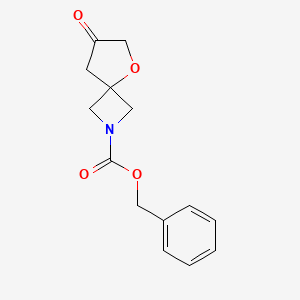 molecular formula C14H15NO4 B13916509 Benzyl 7-oxo-5-oxa-2-azaspiro[3.4]octane-2-carboxylate 