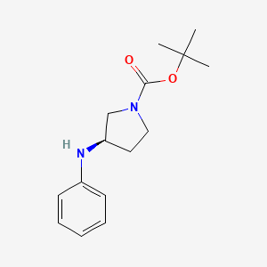molecular formula C15H22N2O2 B13919000 1-N-Boc-(3R)-3-(phenylamino)pyrrolidine 