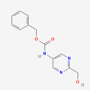 molecular formula C13H13N3O3 B13920470 benzyl N-[2-(hydroxymethyl)pyrimidin-5-yl]carbamate 