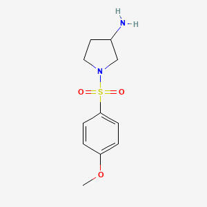 molecular formula C11H16N2O3S B1392724 1-[(4-Methoxyphenyl)sulfonyl]pyrrolidin-3-amine CAS No. 1242905-93-6
