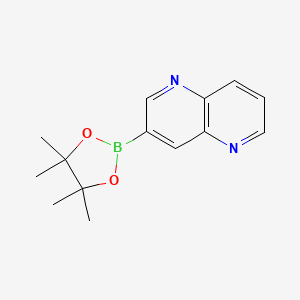 molecular formula C14H17BN2O2 B1392779 3-(4,4,5,5-Tetramethyl-1,3,2-dioxaborolan-2-yl)-1,5-naphthyridine CAS No. 1356165-79-1
