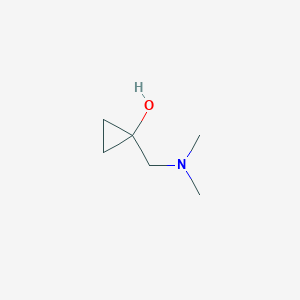 molecular formula C6H13NO B13932549 1-[(Dimethylamino)methyl]cyclopropanol 