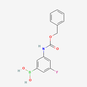 molecular formula C14H13BFNO4 B1393386 (3-(((Benzyloxy)carbonyl)amino)-5-fluorophenyl)boronic acid CAS No. 874290-61-6